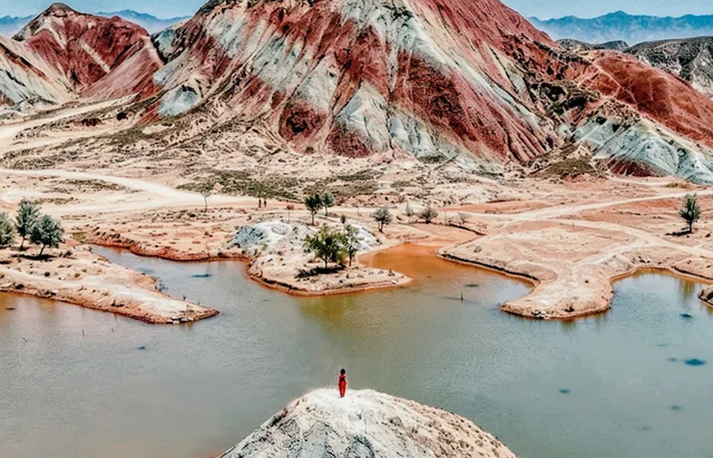 A Danxia photo can be spectacular while access, road condition, and opening status remain uncertain.